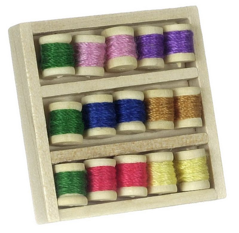Box Filled with Threaded Spools