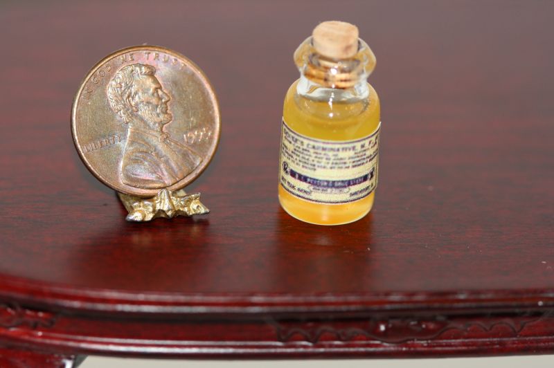 Bottle of "Faux Vintage Yellow Elixir" Medicine