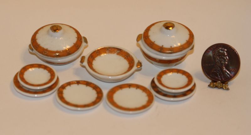 11 Piece Ceramic Plate Set Trimmed in Orange & Gold