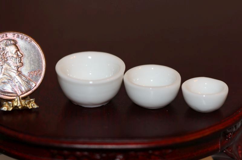 Three White Glazed Ceramic Bowls